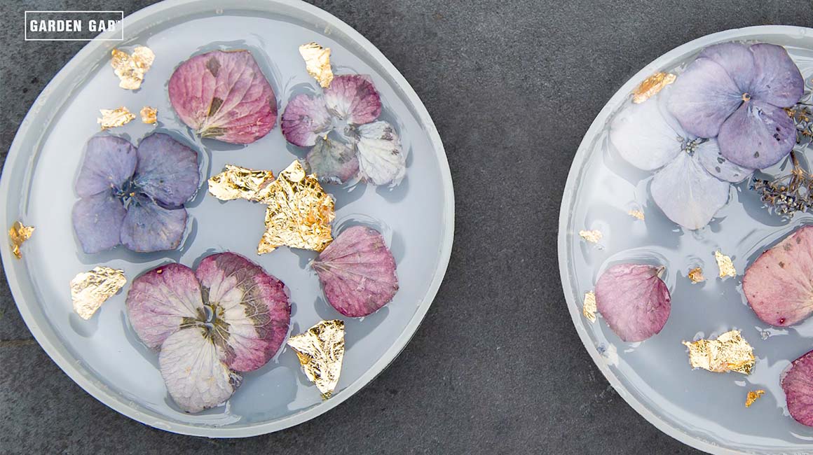 Dried hydrangea petals in resin with gold leaf